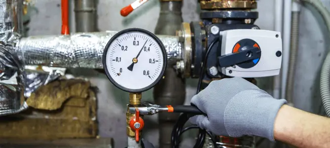 Plumber pressure-testing water lines – Sherwood Park ensuite