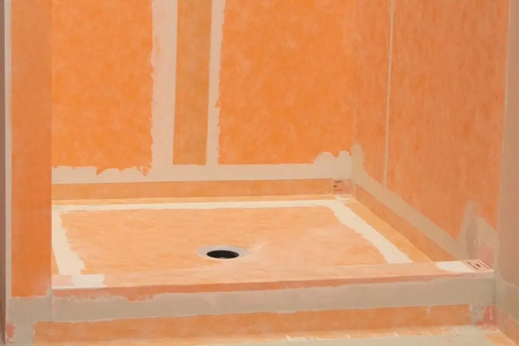 Shower base installation and waterproofing membrane – Sherwood Park ensuite
